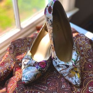 Bellini Charm floral pumps with a 3” heel.